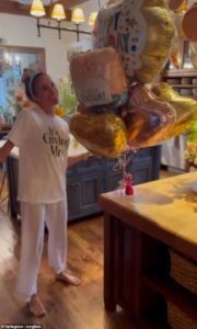 Meghan Markle posts clip of her dancing to a happy birthday song wearing a tiara-like headband as Harry laughs and says ‘oh dear’ – as Duchess celebrates turning 45